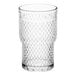 A close-up of a clear Acopa Rivulet beverage glass with a textured pattern.