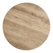 A Lancaster Table & Seating round wood table top with a gray wood finish.