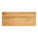 A close-up of a rectangular wood table top with a maple finish.