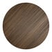 A Lancaster Table & Seating round wood table top with a dark walnut finish.