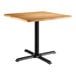 A Lancaster Table & Seating square table with a maple finish top and black base.