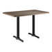 A brown rectangular Lancaster Table & Seating table with black legs.