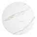A white marble Lancaster Table & Seating round table top.