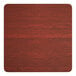 A Lancaster Table & Seating square table top with a red mahogany finish.