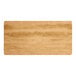 A rectangular wood table top with a maple finish.