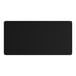 A black rectangular object with a white marble finish.