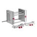 A stainless steel Estella manual turnover machine with red knobs.