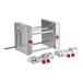 A stainless steel Estella manual turnover machine with red knobs.