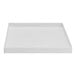 A white square E.L. Mustee Durapan washing machine pan.