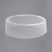 A clear plastic container with a 1" Preformed Clear Non-Perforated Shrink Band on it.