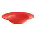 An orange melamine bowl with a wide rim.