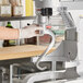 A person using a MainStreet Equipment dough hook on a Galaxy mixer.
