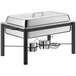 An Acopa wrought iron chafing dish with a stainless steel lid on a table.