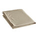 A folded beige umbrella cover on a white background.