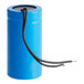A blue MainStreet Equipment start capacitor with black and white wires.
