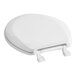 A white Centoco round toilet seat with cover.