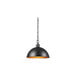 A Globe black and gold pendant light hanging in a restaurant.