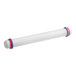 A white plastic tube with purple and pink rubber bands.