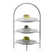 A Hepp by BauscherHepp silver plated stainless steel three tier multi-purpose display stand with desserts on it.