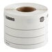 A roll of Cambro white dissolvable labels with black lines and white backgrounds.