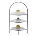 A Hepp by BauscherHepp stainless steel three tiered multi-purpose display stand with desserts on it.