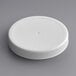 A 70/400 white plastic cap with a ribbed edge.