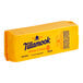 A yellow rectangular package of Tillamook Medium Yellow Cheddar Cheese.