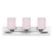 A Canarm Hampton chrome vanity light fixture with three white opal glass shades.