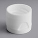 A 20/410 white plastic flip top lid.
