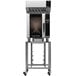 A Moffat Turbofan convection oven on a stainless steel stand.