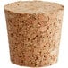 A close up of a cork with a hole in it.