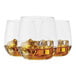 Three Tossware plastic Vino Jr. glasses filled with amber liquid and ice cubes.