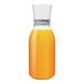 A Tossware plastic carafe filled with orange juice.