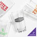 A group of Tossware Reserve customizable plastic glasses on a white background.