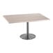 A rectangular Holland Bar Stool table with a stainless steel base and white ash top.