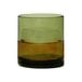 A Tossware Reserve Go-To Moss Tritan plastic rocks glass filled with ice and brown liquid.
