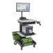 A black Newcastle Systems NB300NU4 adjustable height sit/stand computer cart with a computer screen and barcode scanner.