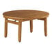 A Lancaster Table & Seating round wooden table with barrel legs.