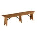 A Lancaster Table & Seating wooden bench with black metal legs.