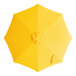 A Lancaster Table & Seating round yellow umbrella canopy with a handle.