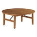 A round wooden Lancaster Table & Seating Vineyard Series outdoor folding table with a metal base.