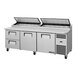 A True commercial refrigerated pizza prep table with two drawers and two doors.
