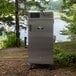 A stainless steel Pro Classic Electric Smokehouse on a cart.