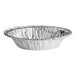 A round silver foil tart pan with a ruffled edge.