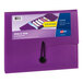 A purple folder with a black strap.