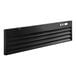 A black metal rectangular front grille with slats and holes.