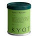 A green Dona Kyoto Ceremonial Matcha Powder container with black text and a green lid.