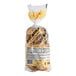 A white bag of Just Bagels garlic bagels.