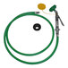 A green hose with a black rubber cap.