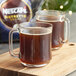 Two mugs of Nescafe Ristretto Decaf instant coffee.